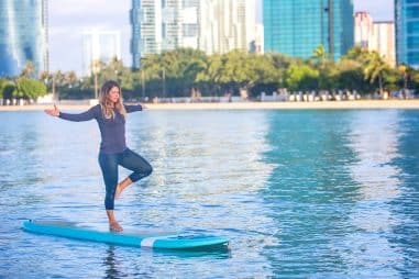 How to Paddle Board and Do Yoga at the Same Time